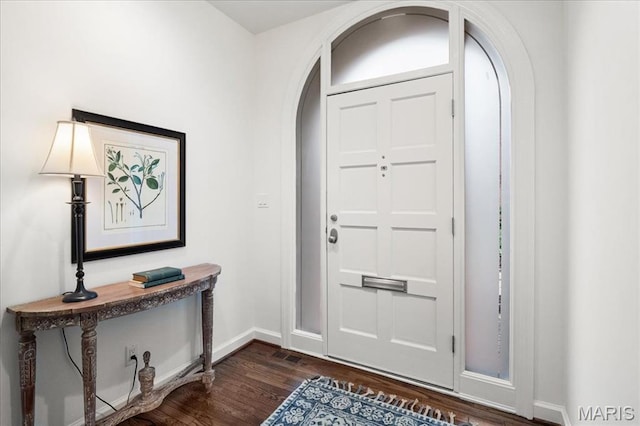139 N Central Ave Unit P, Saint Louis, MO 63105 - entryway with arched walkways and dark wood-type flooring