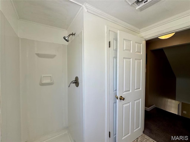 full bath featuring a shower and ornamental molding