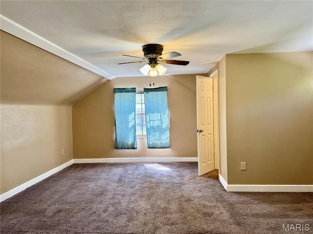 bonus room featuring carpet floors, a ceiling fan, baseboards, and lofted ceiling