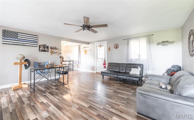 10771 Crest Rd, Dixon, MO 65459 - living area with ceiling fan, wood finished floors, baseboards, and an office area