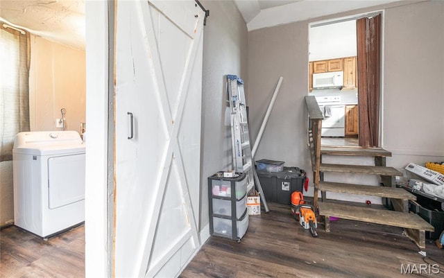 10771 Crest Rd, Dixon, MO 65459 - stairs featuring washer / dryer and wood finished floors