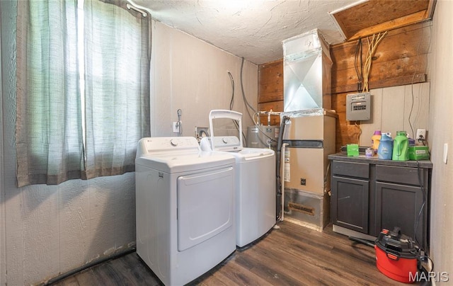 10771 Crest Rd, Dixon, MO 65459 - washroom featuring washing machine and clothes dryer, dark wood-style flooring, and a textured ceiling