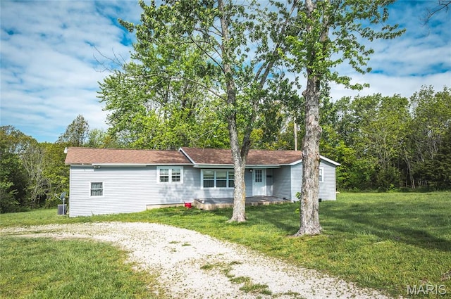 10771 Crest Rd, Dixon, MO 65459 - view of front of house with a front lawn and gravel driveway