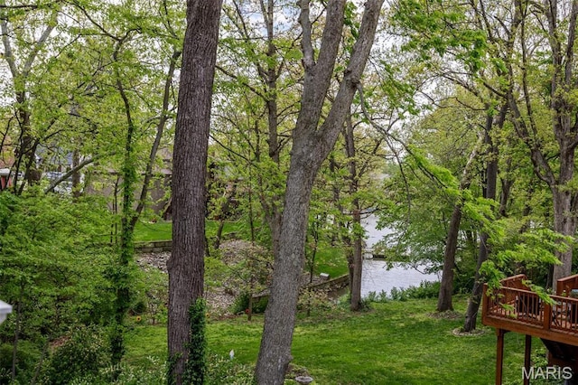 611 Woodchuck Ln, Lake St Louis, MO 63367 - view of grassy yard with a deck with water view