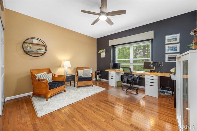 611 Woodchuck Ln, Lake St Louis, MO 63367 - office area with light wood finished floors, a ceiling fan, and baseboards