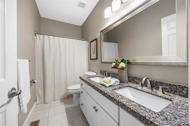 611 Woodchuck Ln, Lake St Louis, MO 63367 - full bathroom with tile patterned floors, toilet, double vanity, and a shower with shower curtain