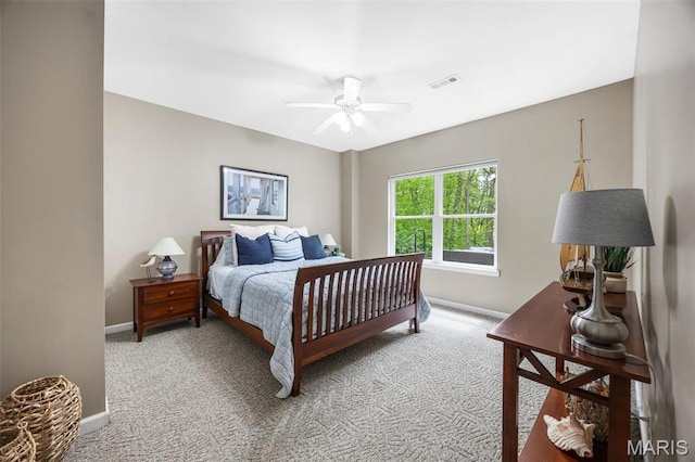 611 Woodchuck Ln, Lake St Louis, MO 63367 - carpeted bedroom with baseboards and ceiling fan