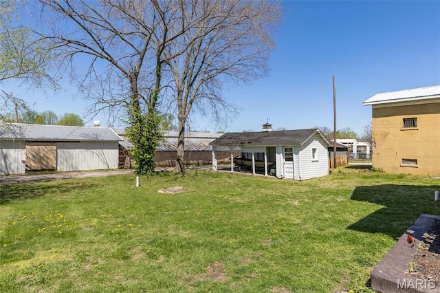 323 N Division St, Bonne Terre, MO 63628 - view of grassy yard with an outbuilding
