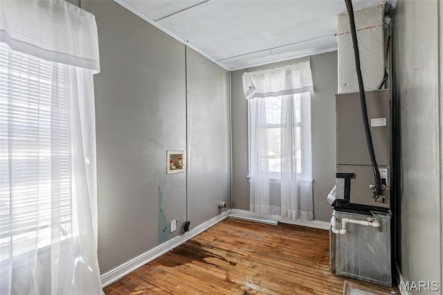 323 N Division St, Bonne Terre, MO 63628 - spare room with ornamental molding, wood finished floors, and baseboards