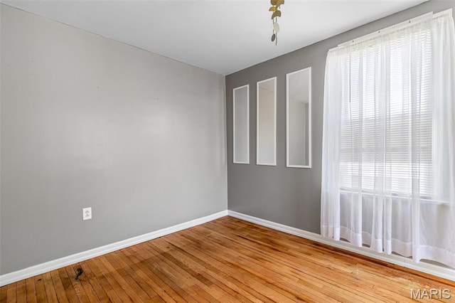 323 N Division St, Bonne Terre, MO 63628 - spare room with baseboards and light wood-type flooring