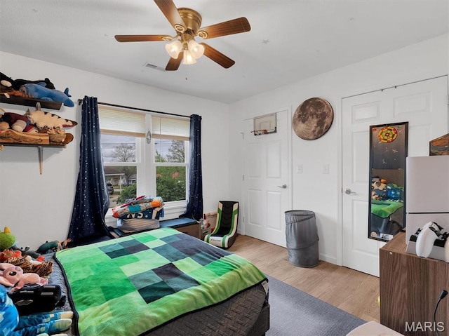 403 Virginia Ave, Potosi, MO 63664 - bedroom with light wood finished floors and ceiling fan