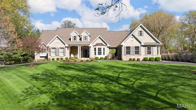 1264 Wilton Ln, Saint Louis, MO 63122 - cape cod home featuring stone siding and a front yard