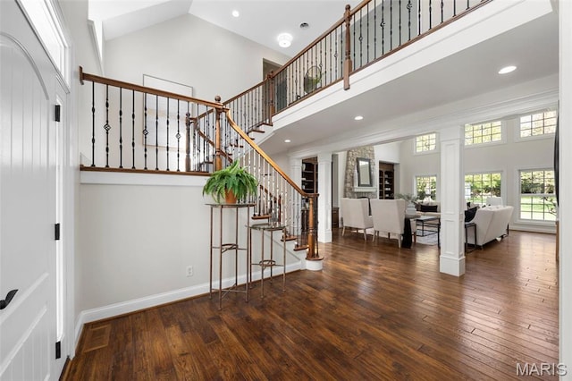 1264 Wilton Ln, Saint Louis, MO 63122 - entryway featuring a high ceiling, wood-type flooring, stairs, recessed lighting, and baseboards