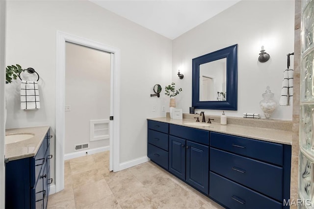 1264 Wilton Ln, Saint Louis, MO 63122 - full bath with two vanities and baseboards