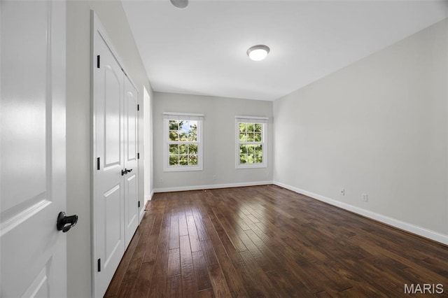 1264 Wilton Ln, Saint Louis, MO 63122 - empty room with dark wood-style flooring and baseboards