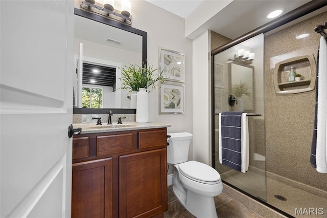 1264 Wilton Ln, Saint Louis, MO 63122 - bathroom featuring a stall shower, toilet, vanity, and tile patterned floors