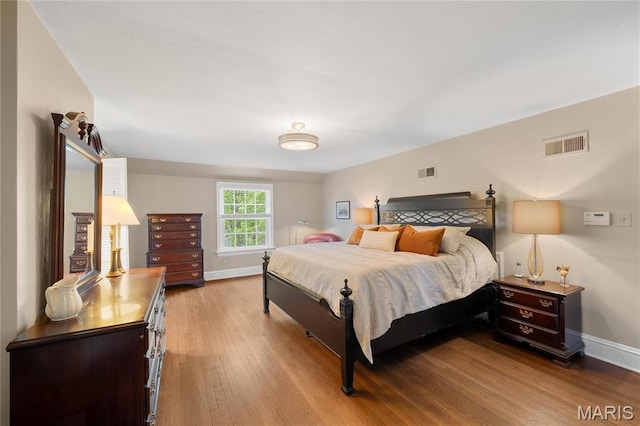 133 Webster Woods Dr, Saint Louis, MO 63119 - bedroom featuring wood finished floors and baseboards