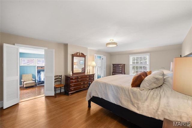 133 Webster Woods Dr, Saint Louis, MO 63119 - bedroom with wood finished floors and a closet