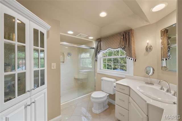 133 Webster Woods Dr, Saint Louis, MO 63119 - full bathroom featuring a stall shower, toilet, vanity, recessed lighting, and tile patterned floors