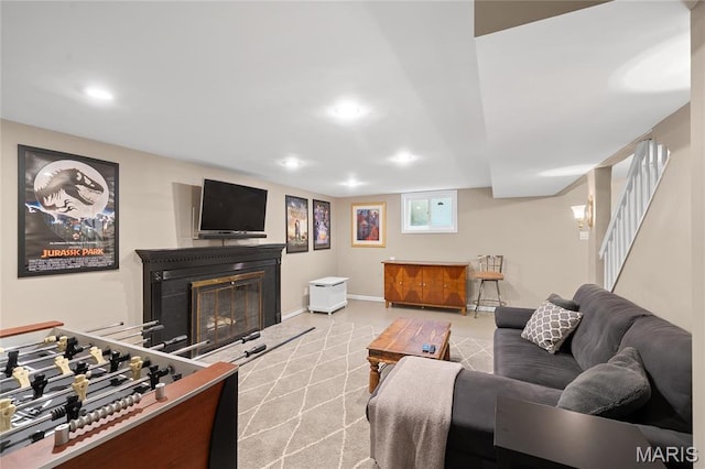 133 Webster Woods Dr, Saint Louis, MO 63119 - living room with a glass covered fireplace, stairway, recessed lighting, and baseboards