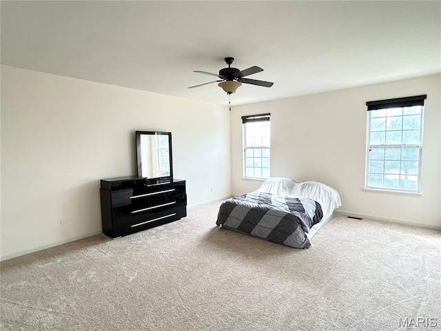 833 Harding St, Saint Peters, MO 63376 - carpeted bedroom with baseboards and ceiling fan