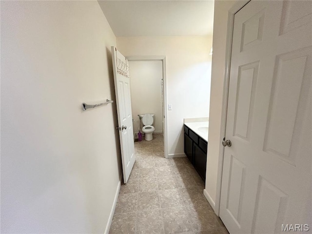 833 Harding St, Saint Peters, MO 63376 - bathroom featuring toilet, baseboards, vanity, and tile patterned flooring
