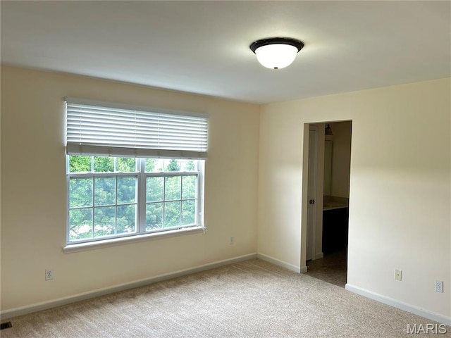 833 Harding St, Saint Peters, MO 63376 - unfurnished room with healthy amount of natural light, carpet floors, and baseboards