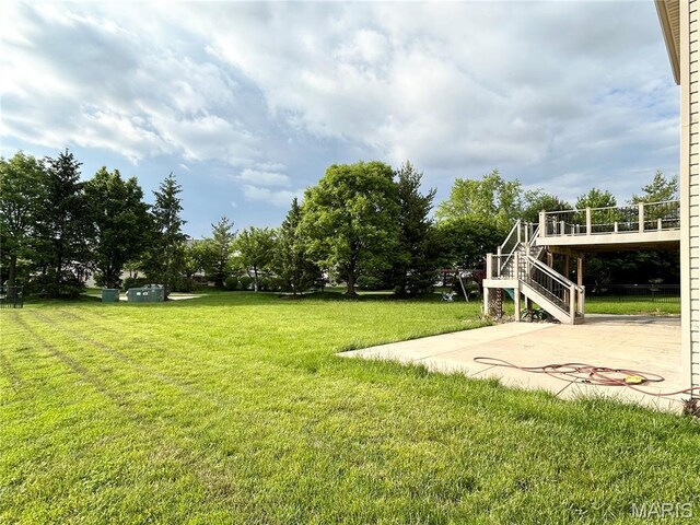 833 Harding St, Saint Peters, MO 63376 - view of grassy yard featuring stairway, a patio, and a wooden deck