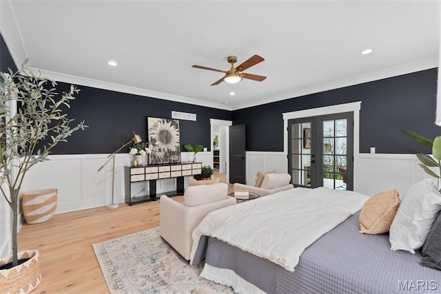705 W Lockwood Ave, Glendale, MO 63122 - bedroom with french doors, ornamental molding, wainscoting, wood finished floors, and a decorative wall