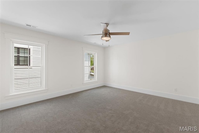 705 W Lockwood Ave, Glendale, MO 63122 - carpeted spare room with baseboards and a ceiling fan