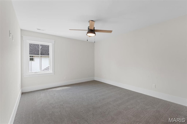 705 W Lockwood Ave, Glendale, MO 63122 - empty room with carpet, ceiling fan, and baseboards