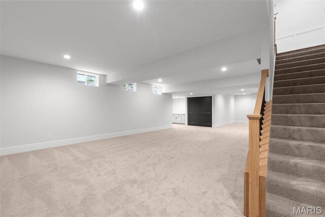 705 W Lockwood Ave, Glendale, MO 63122 - below grade area featuring stairway, recessed lighting, light carpet, and baseboards