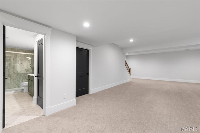 705 W Lockwood Ave, Glendale, MO 63122 - below grade area with light carpet, recessed lighting, and baseboards