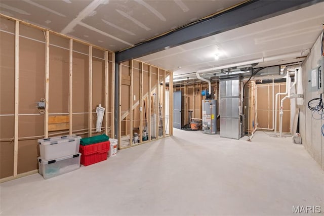 705 W Lockwood Ave, Glendale, MO 63122 - unfinished below grade area featuring gas water heater and heating unit