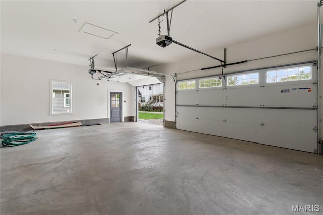 705 W Lockwood Ave, Glendale, MO 63122 - garage featuring a garage door opener