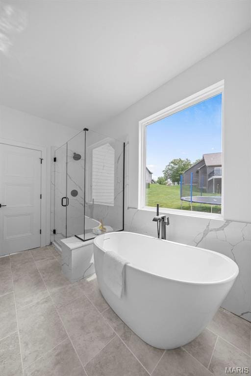 6345 Gibison Rd, Troy, MO 63379 - full bath with a shower stall and a soaking tub
