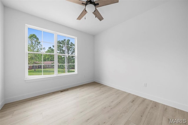 6345 Gibison Rd, Troy, MO 63379 - unfurnished room featuring ceiling fan, light wood-style floors, and baseboards