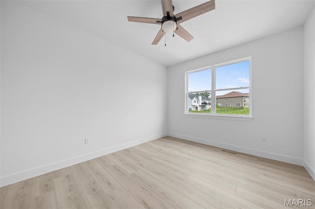 6345 Gibison Rd, Troy, MO 63379 - empty room featuring light wood-style floors, baseboards, and ceiling fan