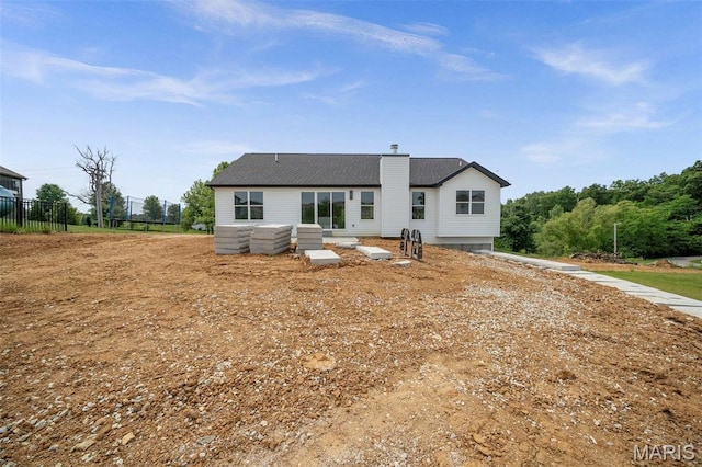 6345 Gibison Rd, Troy, MO 63379 - back of property featuring a chimney and a shingled roof