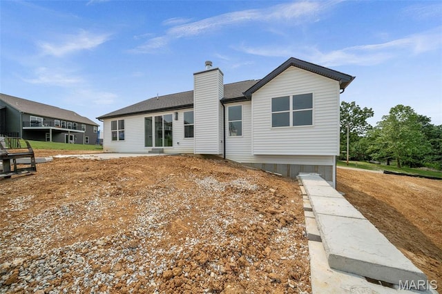 6345 Gibison Rd, Troy, MO 63379 - back of house with a chimney and a shingled roof