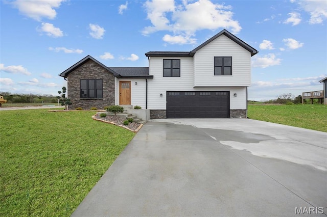 10204 Riehl Farm Dr, Potosi, MO 63664 - view of front facade featuring stone siding, a garage, driveway, and a front yard