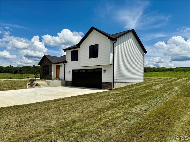 10204 Riehl Farm Dr, Potosi, MO 63664 - view of side of property featuring an attached garage, concrete driveway, and a yard