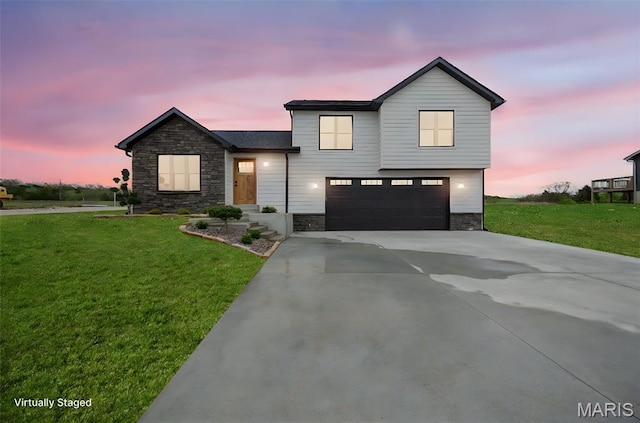 10204 Riehl Farm Dr, Potosi, MO 63664 - view of front facade with stone siding, a garage, a yard, and driveway