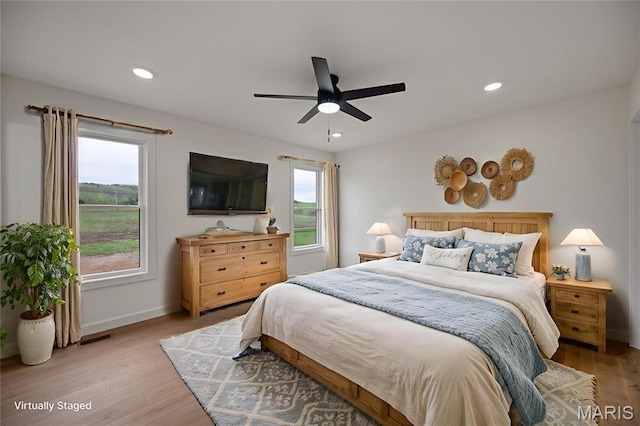 10204 Riehl Farm Dr, Potosi, MO 63664 - bedroom with light wood-style flooring, recessed lighting, and ceiling fan