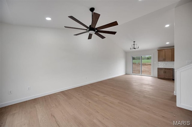 10204 Riehl Farm Dr, Potosi, MO 63664 - unfurnished living room with recessed lighting, a ceiling fan, light wood-type flooring, and lofted ceiling
