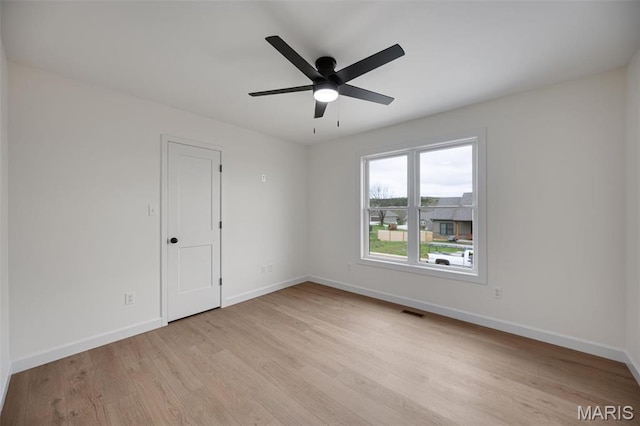 10204 Riehl Farm Dr, Potosi, MO 63664 - empty room with light wood finished floors and a ceiling fan