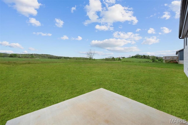 10204 Riehl Farm Dr, Potosi, MO 63664 - view of grassy yard with a patio area and a rural view