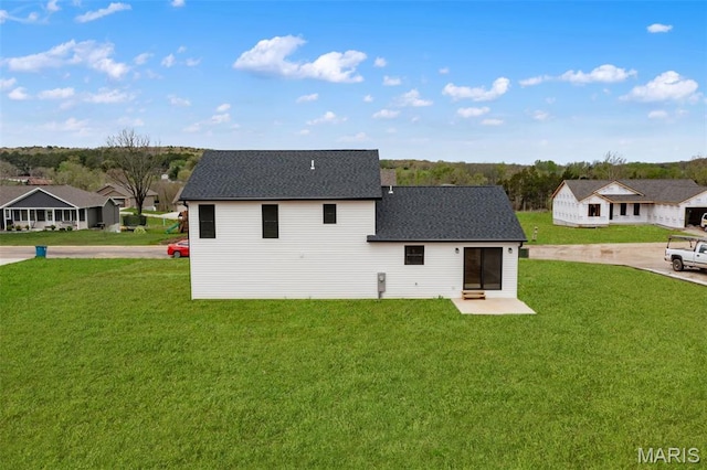 10204 Riehl Farm Dr, Potosi, MO 63664 - rear view of property with a lawn, roof with shingles, and a residential view
