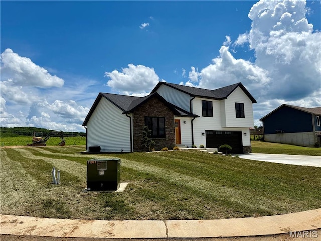 10204 Riehl Farm Dr, Potosi, MO 63664 - view of property exterior with a garage, stone siding, concrete driveway, and a yard