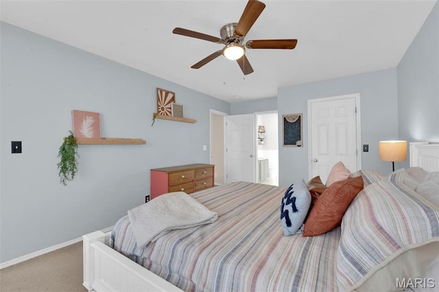 bedroom with carpet flooring, baseboards, and ceiling fan